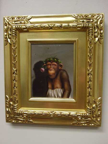 Painting of a chimpanze wearing a dress. In a large gold frame.